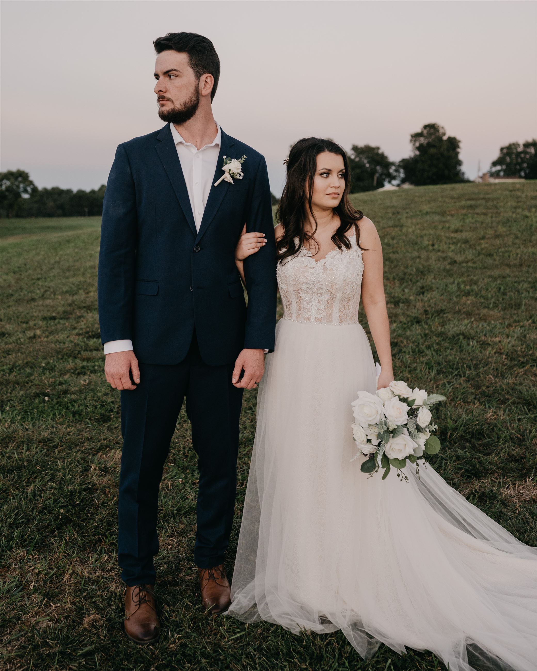 Bride and groom standing next to each other at wedding venue in South Carolina