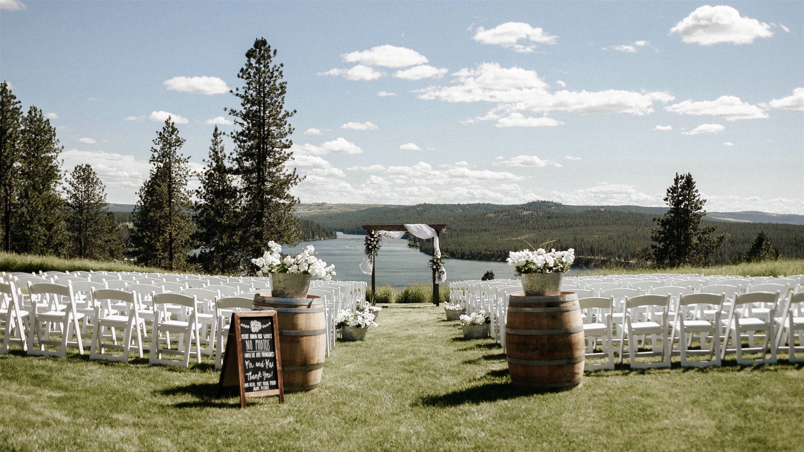 wedding venue overlooking a lake and mountains